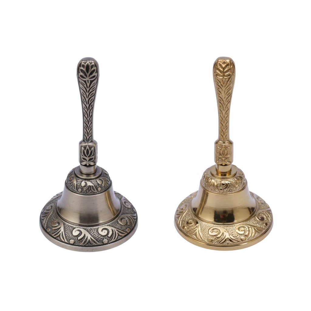 Pair of Fab2274 traditional hand-held Nakshi bells in antique brass and Gold finishes featuring intricate floral engravings and a decorative embossed handle.