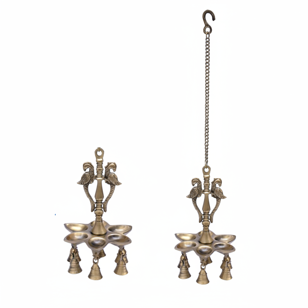 Traditional Fab2277 antique brass hanging diya featuring twin peacock motifs, five oil wick compartments, and five decorative small bells suspended from a metal link chain.