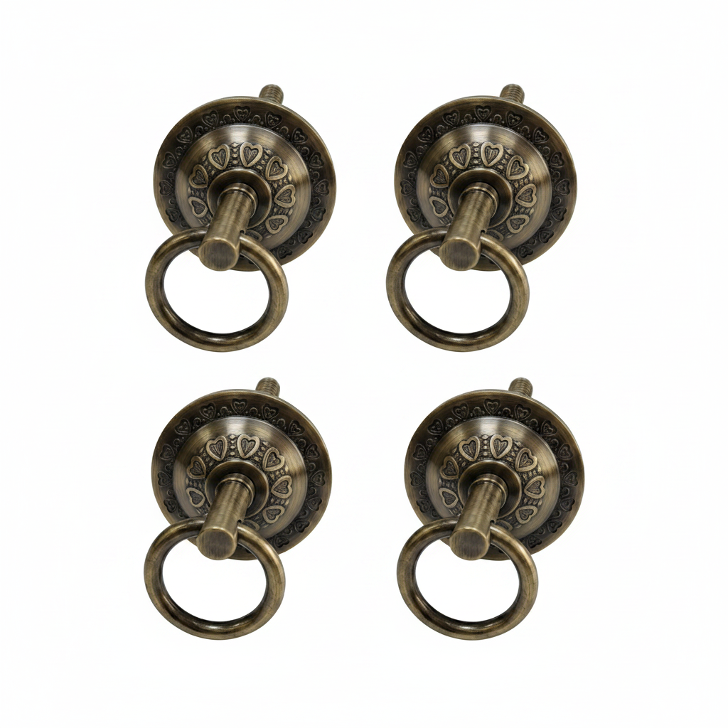 antique brass finish bottom kada for jhula seats featuring a decorative heart-shaped embossed pattern and heavy-duty pivot ring for traditional indoor swings.