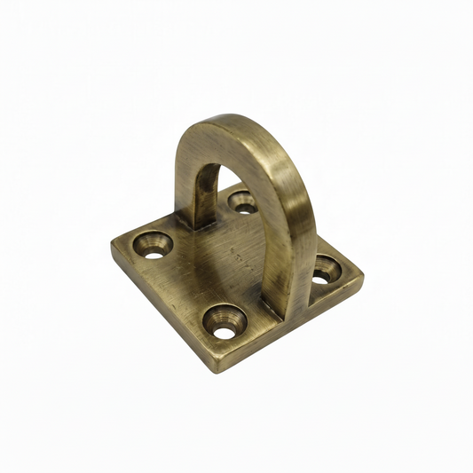 A premium DLP166 D-hook mounting bracket featuring a vintage antique brass finish. This heavy-duty hardware includes a reinforced U-shaped anchor loop on a thick square base plate with four precision-drilled countersunk holes for secure installation. Ideal for mounting indoor swings (Jhulas), hanging chairs, or decorative architectural fixtures, combining high load-bearing structural safety with a classic luxury aesthetic for home interiors.