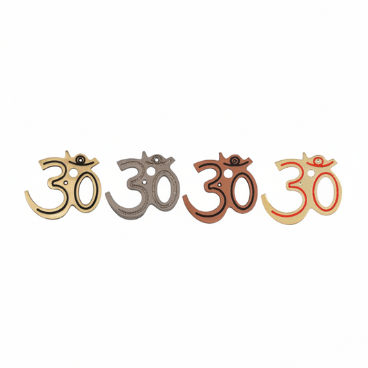 Fab0226 metal Om wall accents featuring a modern curved Devanagari script with recessed decorative borders, shown in antique brass, copper, satin, gold and red mina finishes with dual mounting holes.