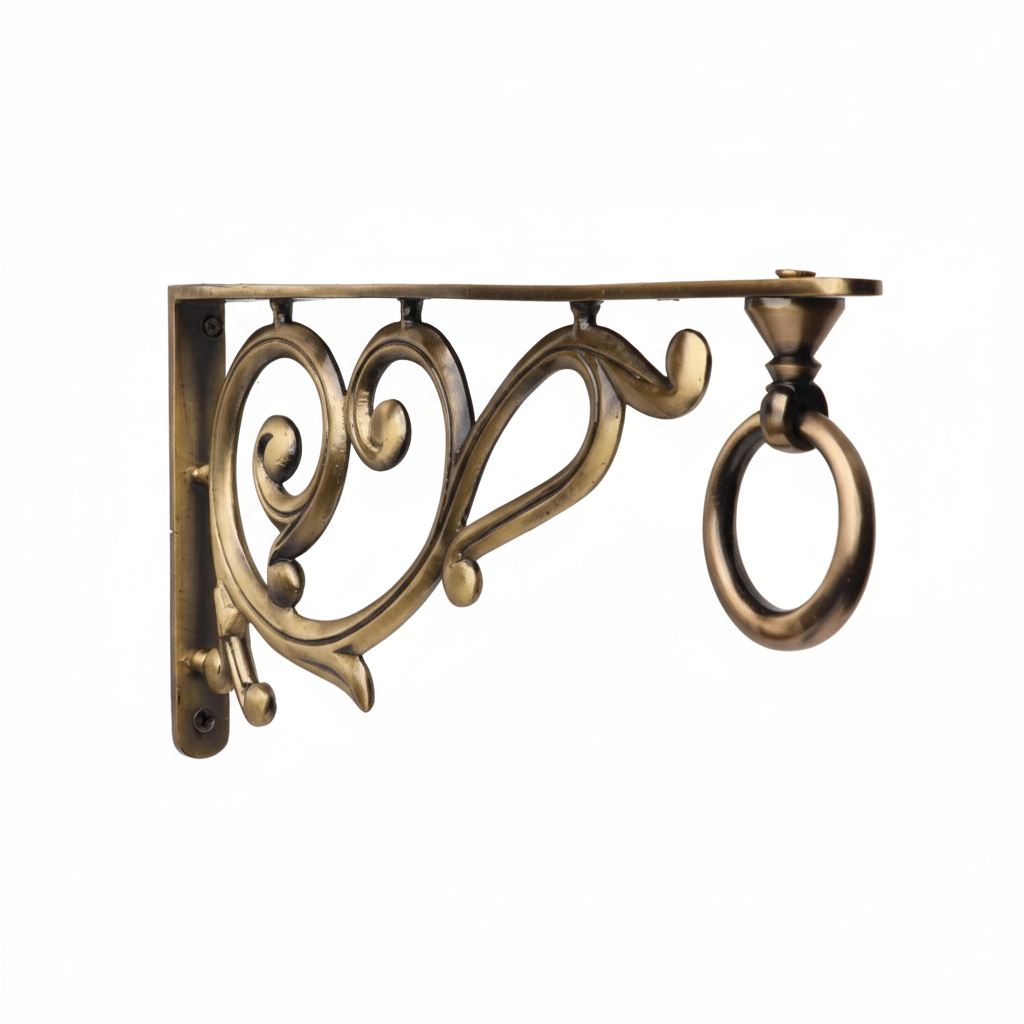 Fab2047 heavy-duty metal wall bracket in antique brass finish featuring a decorative heart-shaped scrollwork design and a built-in circular pivot ring for hanging bells or lanterns
