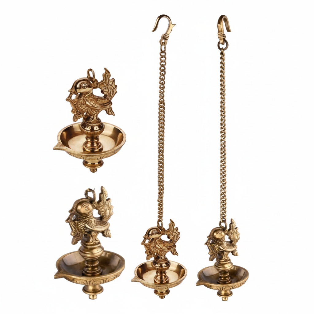 Traditional Fab2164 hanging peacock diya in an antique brass finish featuring a highly detailed bird motif with an upright plumage, a circular oil basin with a pointed wick spout, and a long hanging chain with hook.