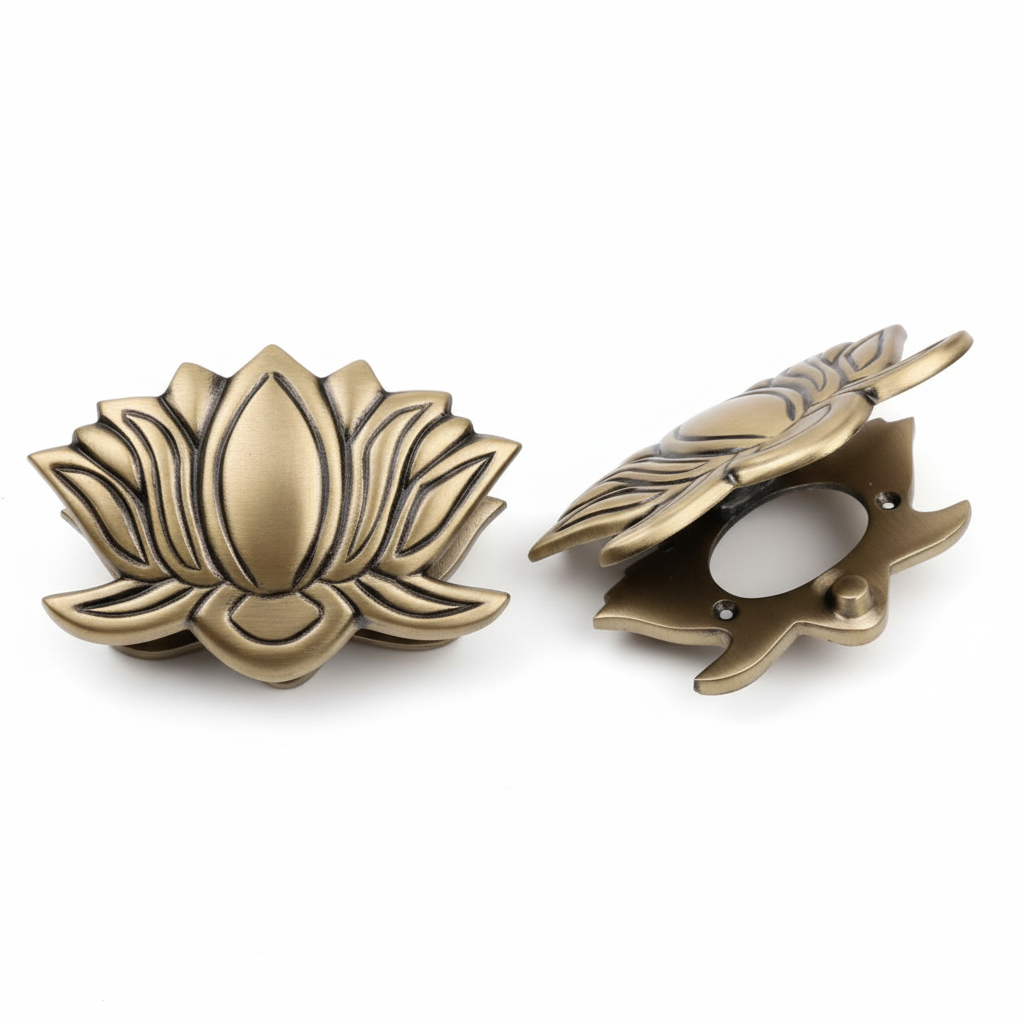 antique brass door knocker in a stylized lotus flower design, featuring one closed handle showing the ornate petal carvings and one open handle revealing the concealed mounting plate and circular finger pull mechanism.