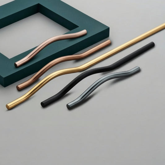 A premium collection of Creatick AL-68 modern cabinet handles featuring a unique, slim curved wave or "S" shaped profile. These minimalist sculptural pulls are shown in various lengths and designer finishes including rose gold, champagne gold, matte black, and gunmetal grey—an artistic hardware choice for contemporary kitchen cabinetry and bespoke furniture.