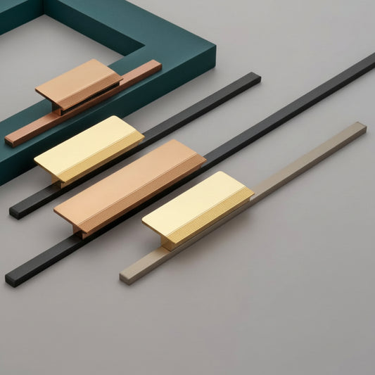 A luxury collection of Creatick AL-74 modern cabinet handles featuring a minimalist T-bar edge-pull design with a subtle diamond-knurled texture on the grip. These premium aluminum pulls are shown in various lengths and designer finishes including satin gold, rose gold, matte black, and antique silver—an elegant hardware solution for contemporary kitchen cabinetry and bespoke furniture.