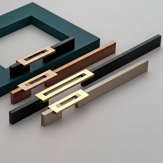 A premium collection of Creatick AL-77 modern cabinet handles featuring a minimalist flat bar base with a unique hollow rectangular top grip. These designer dual-tone pulls are shown in multiple lengths and finishes including matte black with gold, brushed rose gold, and champagne silver—an ideal architectural hardware choice for luxury kitchen cabinetry and contemporary furniture design.