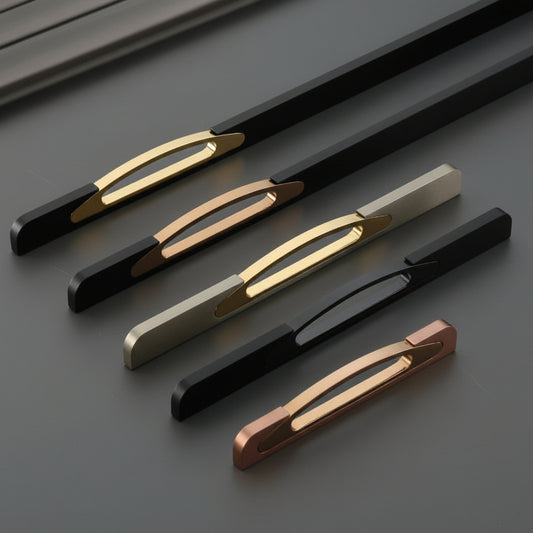 A luxury collection of Creatick AL-86 modern cabinet handles featuring a minimalist flat bar design with an elegant oval-shaped cutout grip. These designer dual-tone pulls are shown in various lengths and premium finish combinations including matte black with gold, brushed silver with gold, and rose gold—an ideal architectural hardware choice for high-end kitchen cabinetry and bespoke furniture.