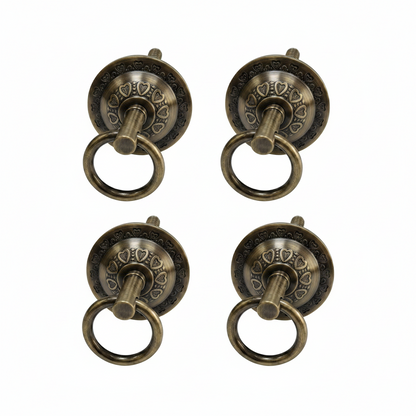 antique brass finish bottom kada for jhula seats featuring a decorative heart-shaped embossed pattern and heavy-duty pivot ring for traditional indoor swings.