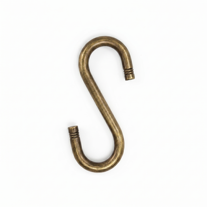 Heavy-duty antique brass finish SS-304 stainless steel S-hook with decorative ribbed end detailing for traditional indoor jhula and oonjal chain sets.