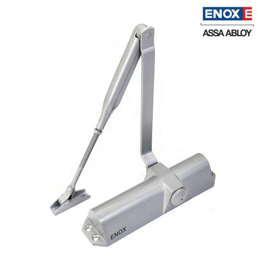 A surface-mounted ENOX (Assa Abloy) hydraulic door closer featuring a durable silver finish and a standard adjustable scissor arm. This commercial-grade door control hardware is designed for reliable self-closing performance on wooden or metal doors, offering adjustable closing and latching speeds to ensure safety and security in high-traffic office and residential environments.