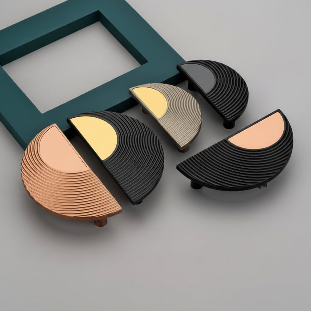 A collection of Creatick DH-104 modern conceptual door handles in half-moon shapes, featuring textured linear patterns. The handles are shown in elegant black and gold, rose gold, and champagne finishes, displayed against a minimalist grey background with a teal accent frame, ideal for contemporary furniture and luxury cabinet hardware.