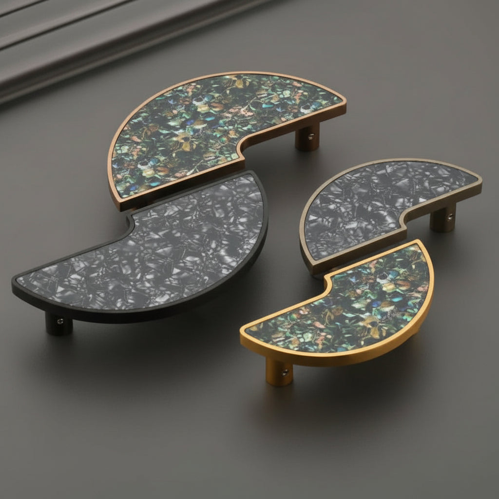 A luxury collection of Creatick DH-107 modern semi-circle cabinet handles featuring sophisticated terrazzo and crushed stone inlays. These artistic furniture pulls are shown in matte black, antique brass, and polished gold frames with emerald green and monochrome stone textures—ideal for high-end kitchen cabinetry and bespoke furniture design.