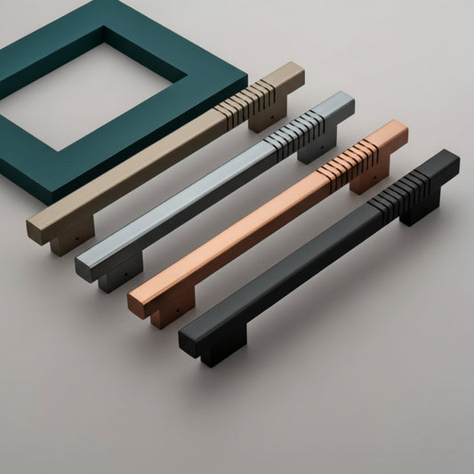 A variety of Creatick DH-25 modern square door pull handles featuring unique linear etched accents on the grip. The collection is shown in elegant finishes including antique brass, brushed silver, rose gold, and matte black, displayed against a minimalist grey background with a teal accent frame for luxury door hardware inspiration.