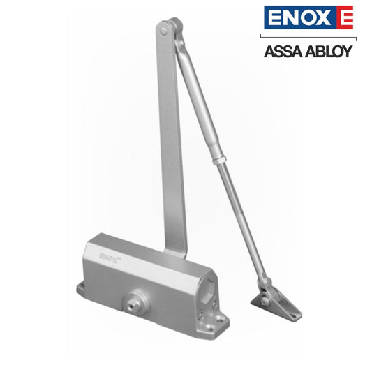 A professional-grade ENOX (Assa Abloy) surface-mounted hydraulic door closer in a classic silver finish. This heavy-duty door control unit features a robust body design and an adjustable scissor arm assembly. It is engineered for smooth self-closing performance on commercial and residential doors, offering reliable hydraulic damping and adjustable closing speeds for enhanced building security and accessibility.