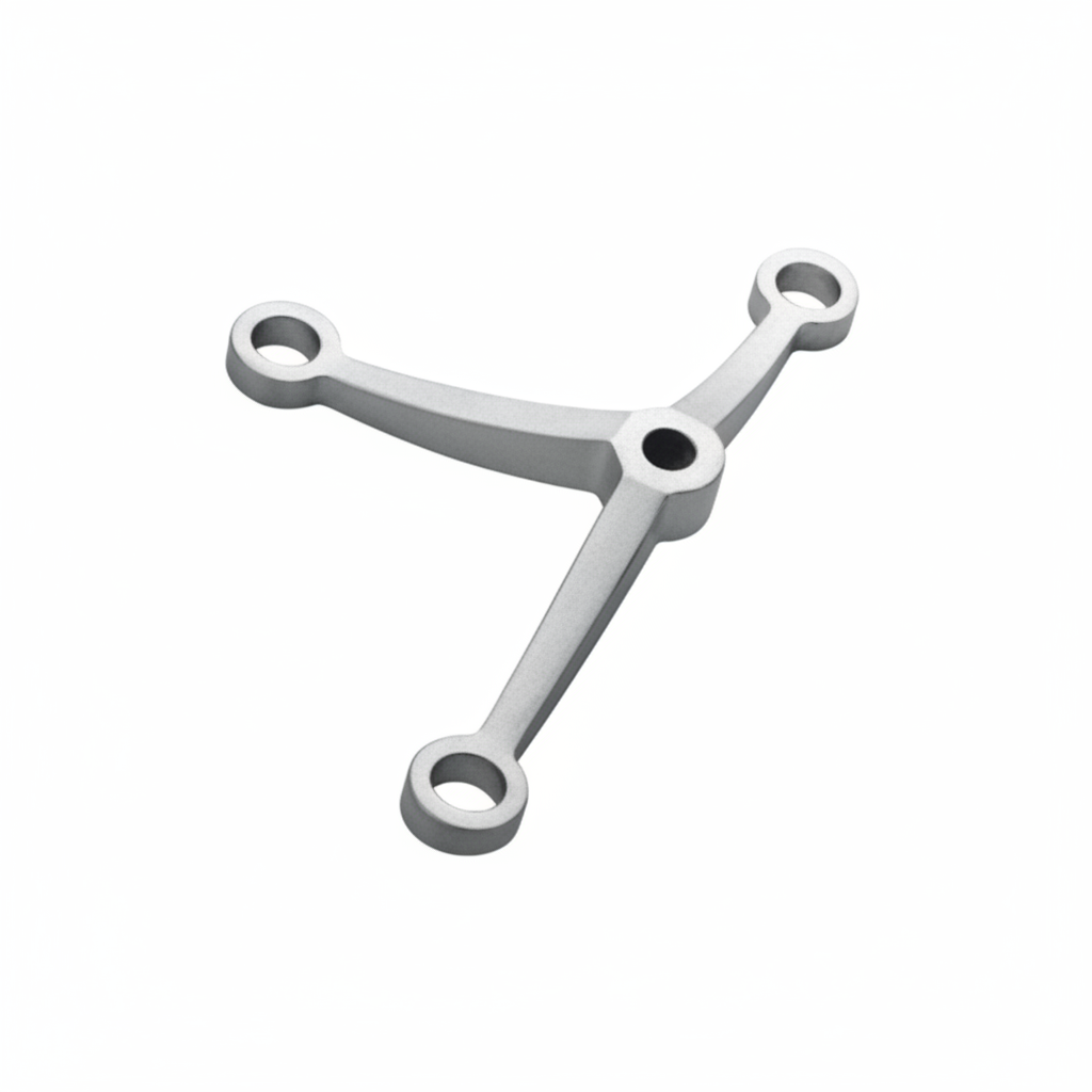 An ESPIDER022A three-arm glass spider fitting in a premium satin stainless steel finish. This architectural hardware is designed for point-fixed glass curtain walls, canopies, and partitions, providing a durable and minimalist solution for connecting multiple glass panels in modern commercial buildings.