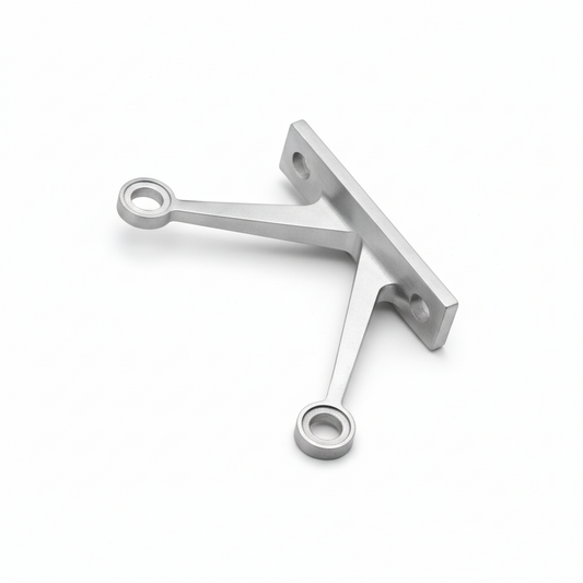 An ESPIDER030A two-arm V-shape glass spider fitting with a flat fin-mount base, featuring a high-quality satin stainless steel finish. This architectural hardware is designed for point-fixed glass curtain walls and structural fin stabilization, providing a sleek, minimalist, and secure connection for connecting multiple glass panels in modern commercial facades.