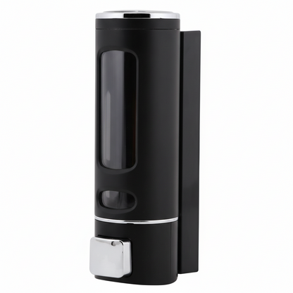 Grafiqe wall-mounted cylindrical liquid dispenser featuring a premium black finish, a large vertical transparent viewing window for soap levels, and a chrome manual push-button pump for organized bathroom and shower storage.