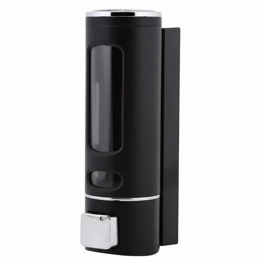 Grafiqe wall-mounted cylindrical liquid dispenser featuring a premium black finish, a large vertical transparent viewing window for soap levels, and a chrome manual push-button pump for organized bathroom and shower storage.