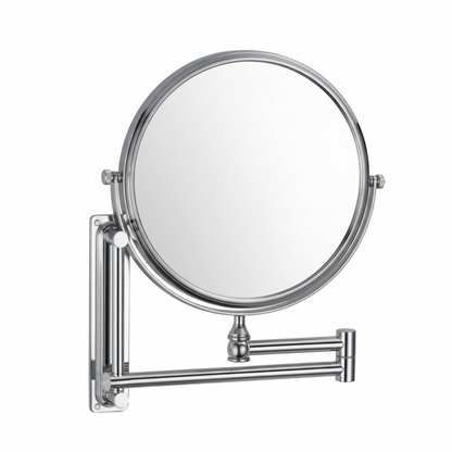 Grafiqe wall-mounted circular magnifying mirror in a polished chrome finish, featuring a 360-degree double-sided swivel head and a heavy-duty extendable double-jointed arm for flexible grooming and makeup application.
