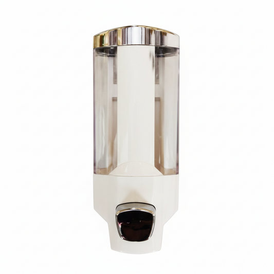 Grafiqe wall-mounted manual soap dispenser featuring a clear vertical reservoir for level monitoring, a high-gloss white housing, and a polished chrome push-button for easy liquid dispensing in showers and vanities.