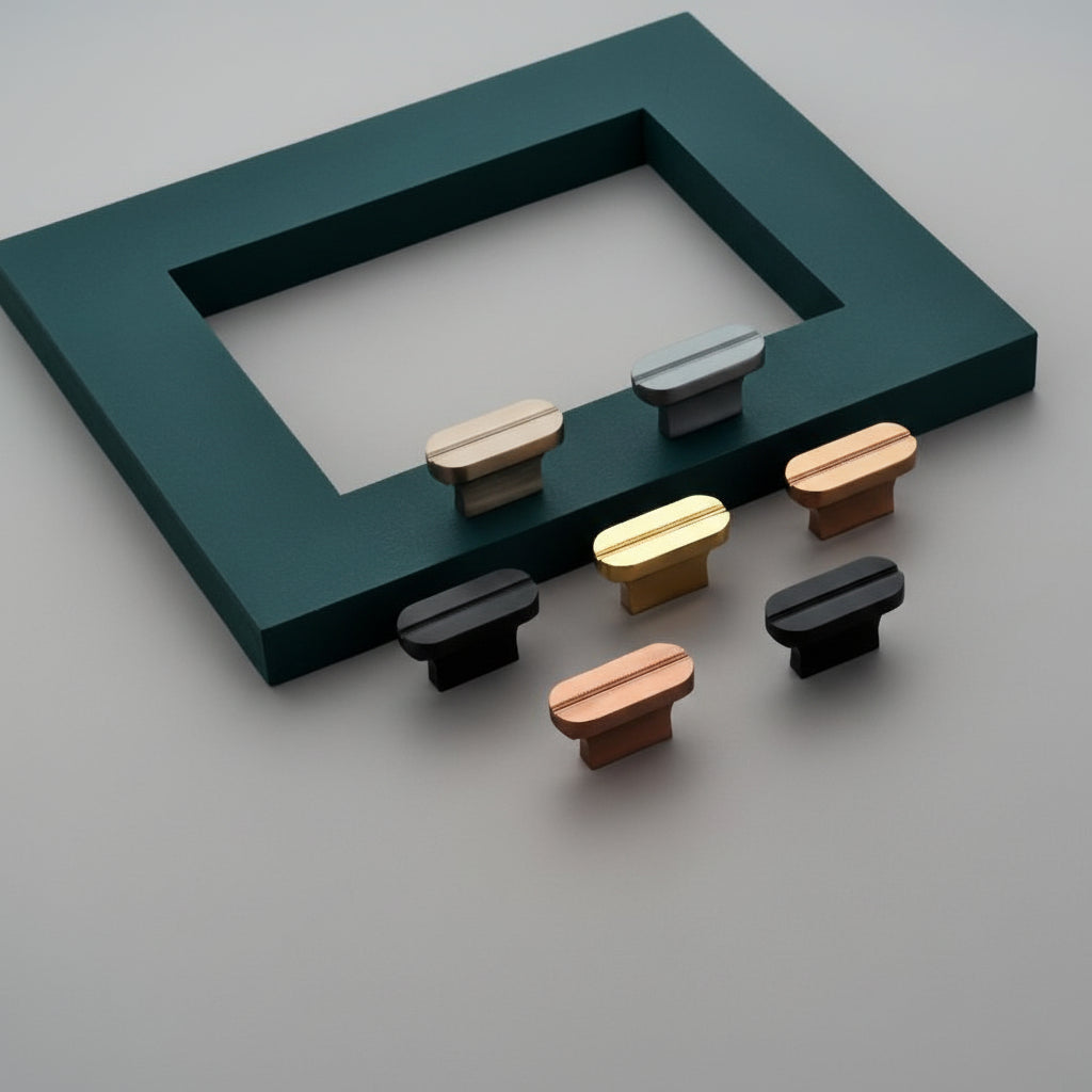 A premium showcase of Creatick KB-75 modern cabinet knobs, featuring a minimalist T-bar design with a sleek center groove detail. This collection highlights a versatile range of high-quality finishes, including matte black, rose gold, satin nickel, gray, and classic gold. These contemporary hardware pieces are designed to elevate the aesthetic of kitchen cabinetry, designer wardrobes, and high-end furniture.