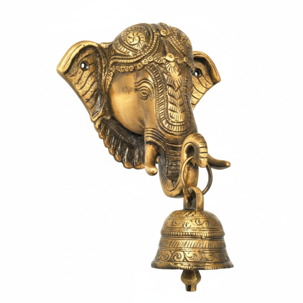 An antique brass wall-mounted hanging bell featuring a highly detailed Lord Ganesha face with an ornate crown and a decorative hanging puja bell, designed for home temple or pooja room decoration.