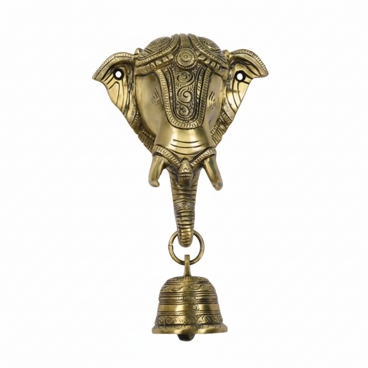 A gold finish Lord Ganesha wall-mounted hanging bell featuring a detailed Ganesha face with an ornate crown and a decorative hanging puja bell, designed for home temple or pooja room decoration.