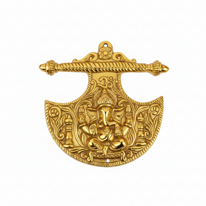 A po gold finish wall-hanging accent in the shape of a Parashu (axe) featuring a central Lord Ganesha icon, a sacred Om symbol, and intricate floral carvings, designed for home temple decoration or auspicious entryway placement.