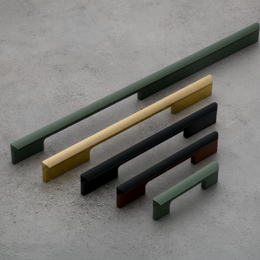 A collection of modern fluted profile cabinet handles in various lengths and premium finishes, including forest green, brushed gold, matte black, and dark mahogany. The image showcases the elegant textured vertical ridges and sleek geometric silhouette, ideal for luxury kitchen cabinetry, custom wardrobes, and contemporary furniture designs.