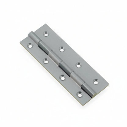 A high-quality brass butt hinge featuring a sleek rhodium satin finish. This durable door hinge includes eight countersunk screw holes and a five-knuckle design, perfect for heavy-duty cabinet and door installations.