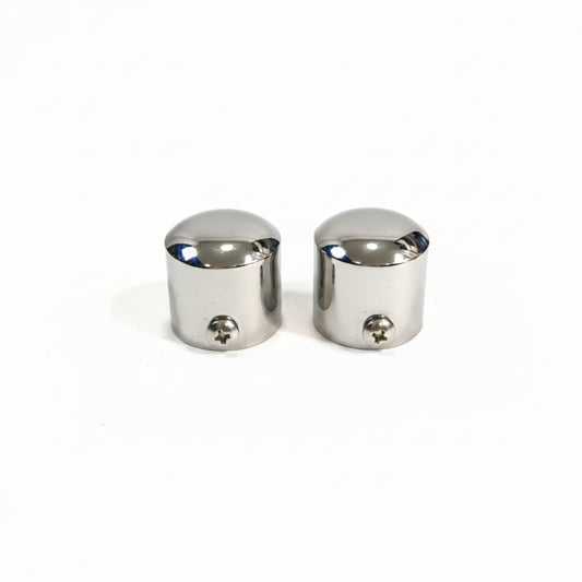 A pair of high-quality stainless steel end caps for glass railings featuring a polished chrome finish. These durable balustrade fittings include integrated side screws for secure mounting on round handrail posts, providing a clean and professional finish to modern architectural railing systems.