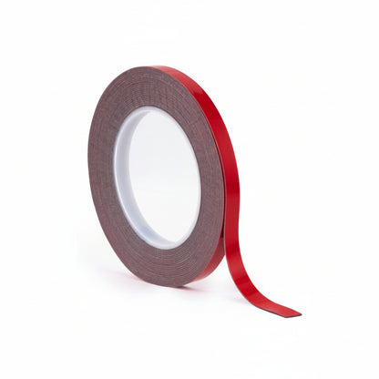 A single roll of ABRO Grey High Bond (GHB) double-sided acrylic foam tape standing upright. The image shows the grey adhesive core and the distinctive red protective liner, ideal for industrial-strength mounting and automotive applications.